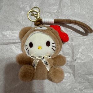 Brown Hello Kitty Plush Keychain with Red Bow